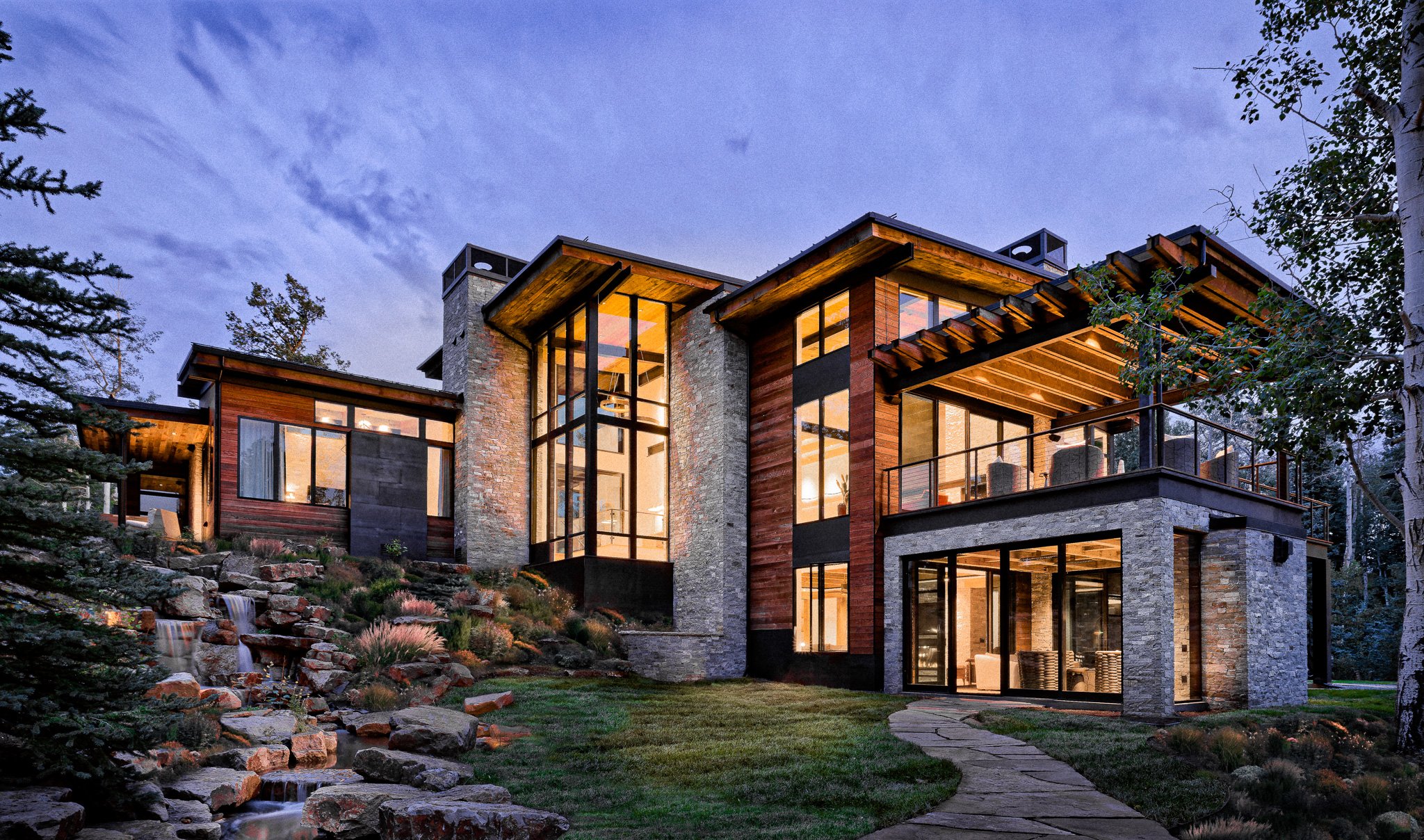 Artisan Builders architectural project with a mountain backdrop